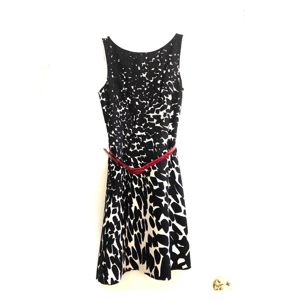 Black and white dress with contrasting red belt